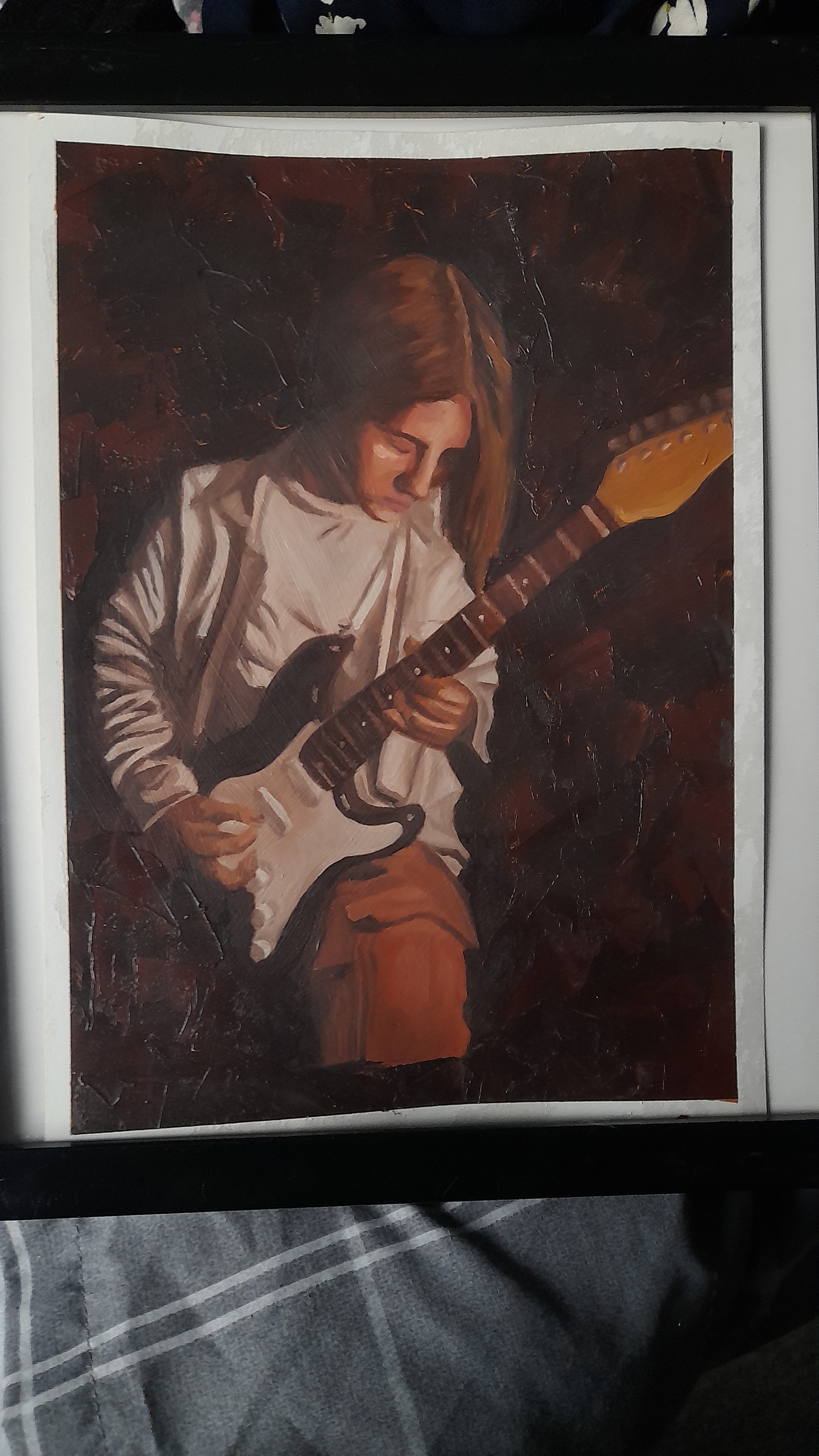 This oil painting was also one of my first, it is a painting of my boyfriend playing guitar. I created this piece as a present for him and I was very happy with the result, particularly the textured background.